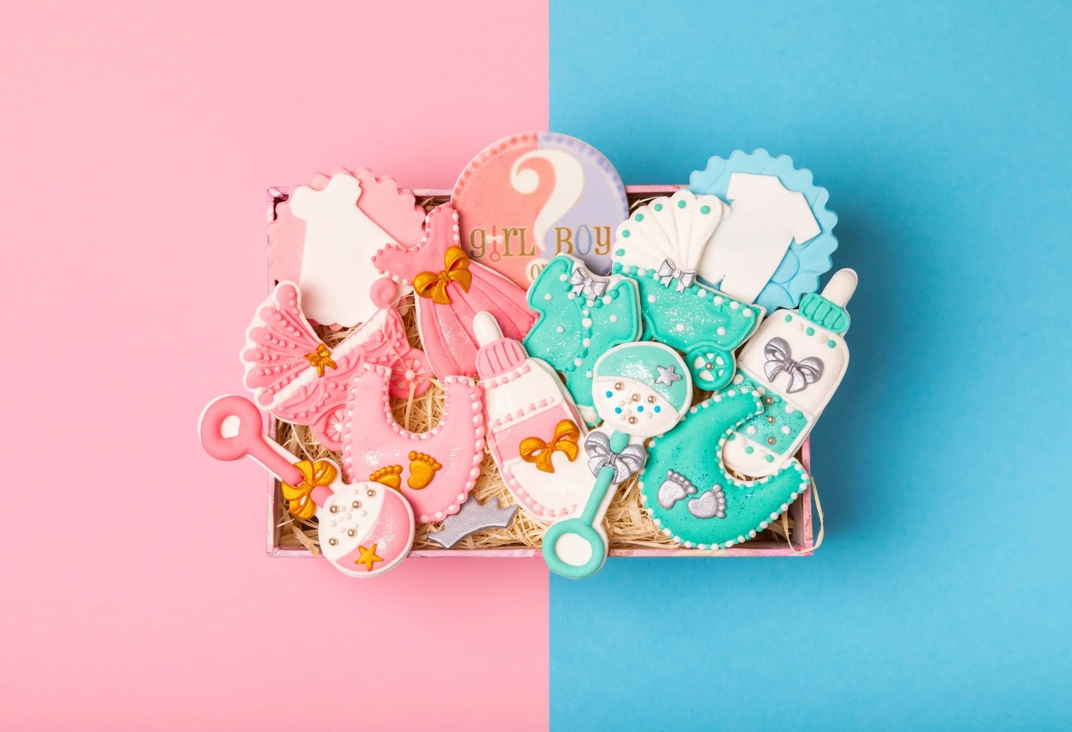 Pastel blue and pink baby shower decorated sugar cookies