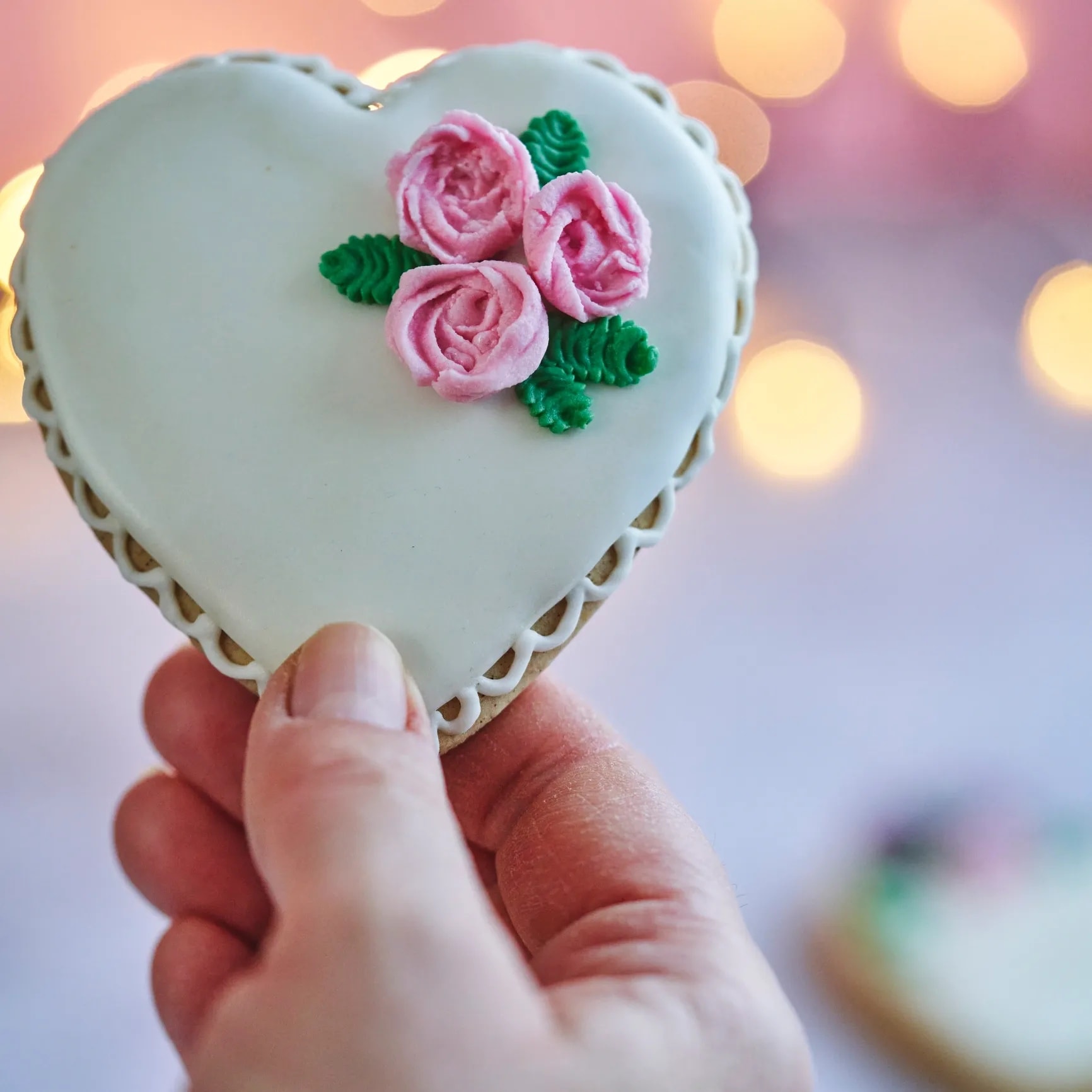 White royal icing wedding heart sugar cookies with lace detail