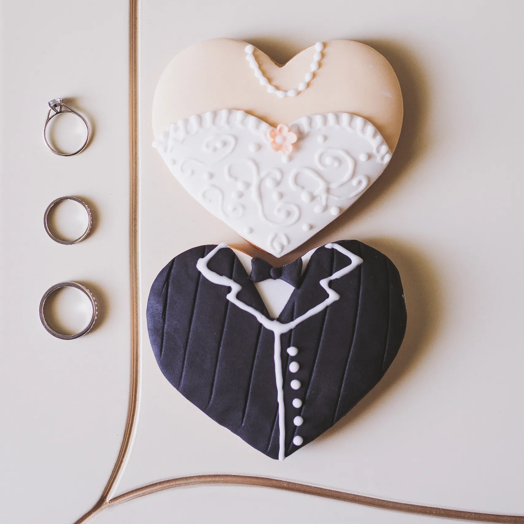 Wedding dress and ring shaped decorated sugar cookies